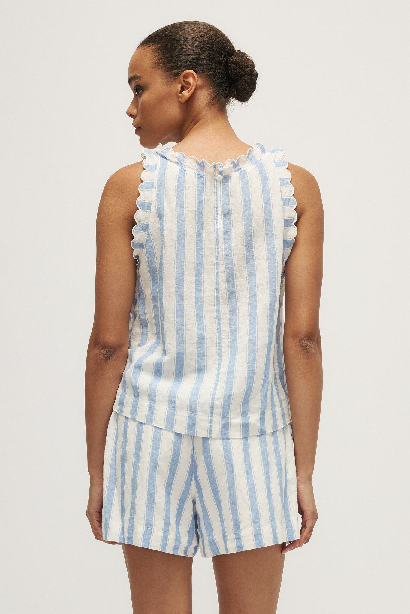 Keep the brand name KIMY unchanged, Lt is bleu clair, wide stripe becomes à larges rayures, preserve the product code/name structure properly for native French.