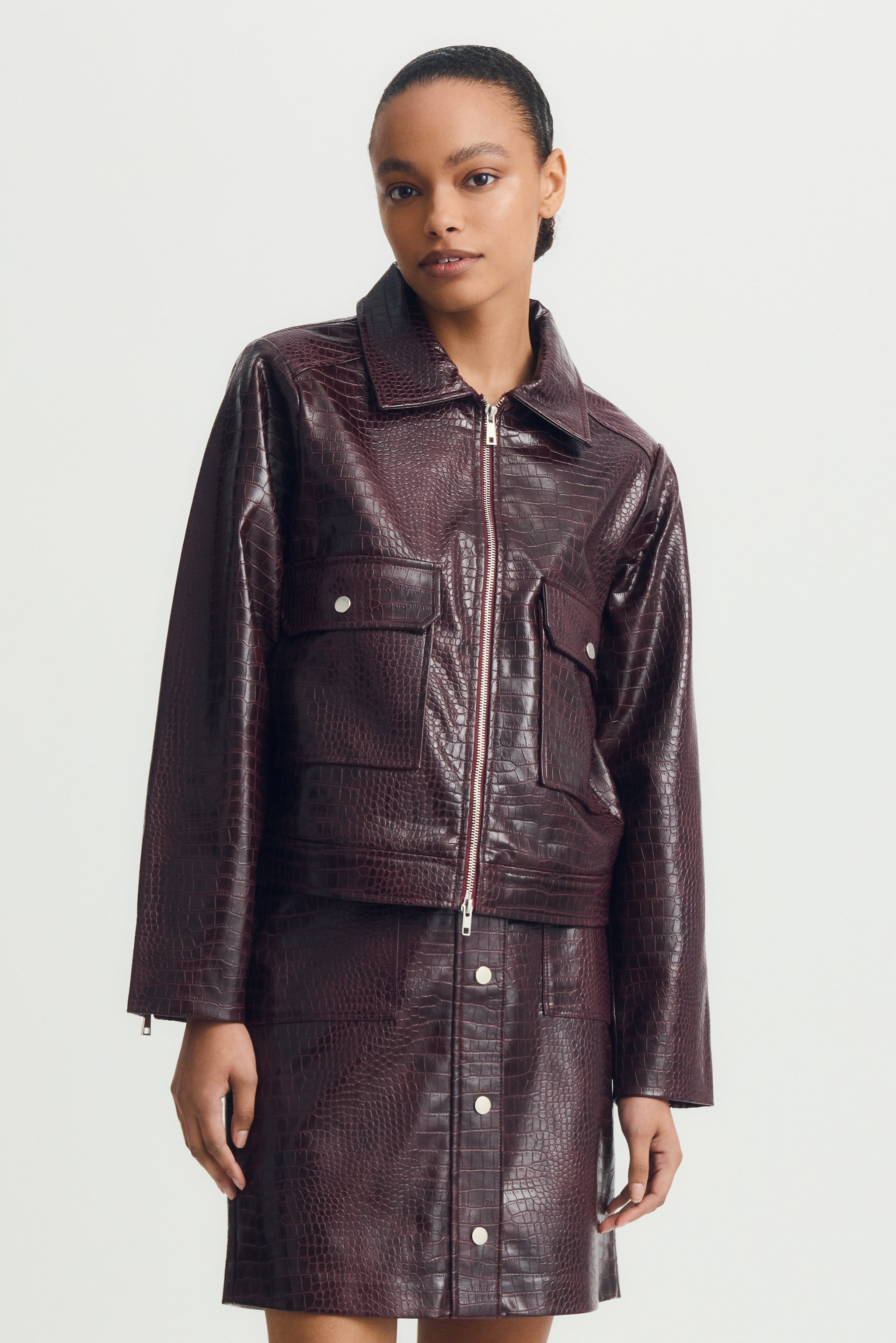 RUSSI SKIRT-Burgundy skin text.
